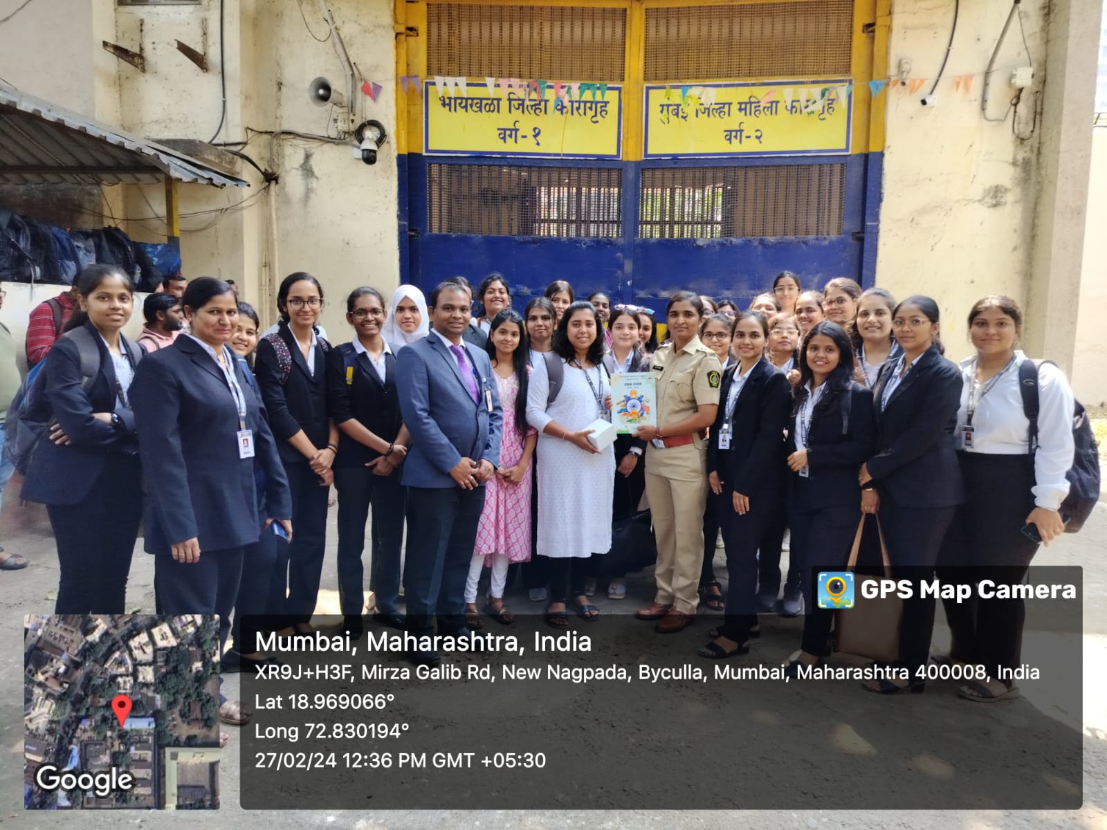 Student presentation of legal publication to Byculla prison superintendent