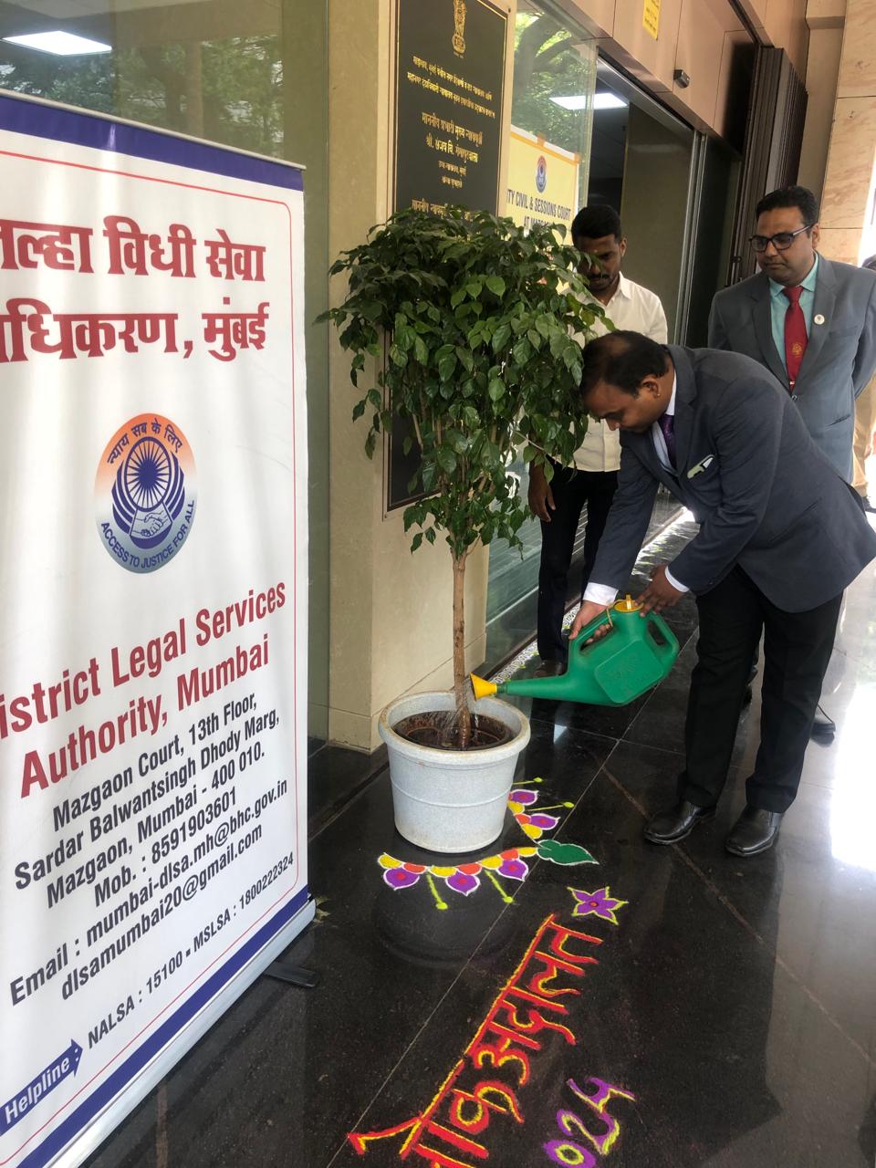 Ceremonial tree watering inaugurating National Lok Adalat at Mazgaon Court