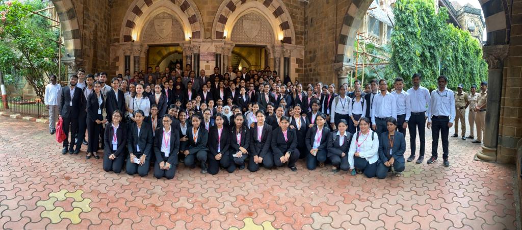 Delegation of law students inside historic Bombay High Court under Gothic arches
