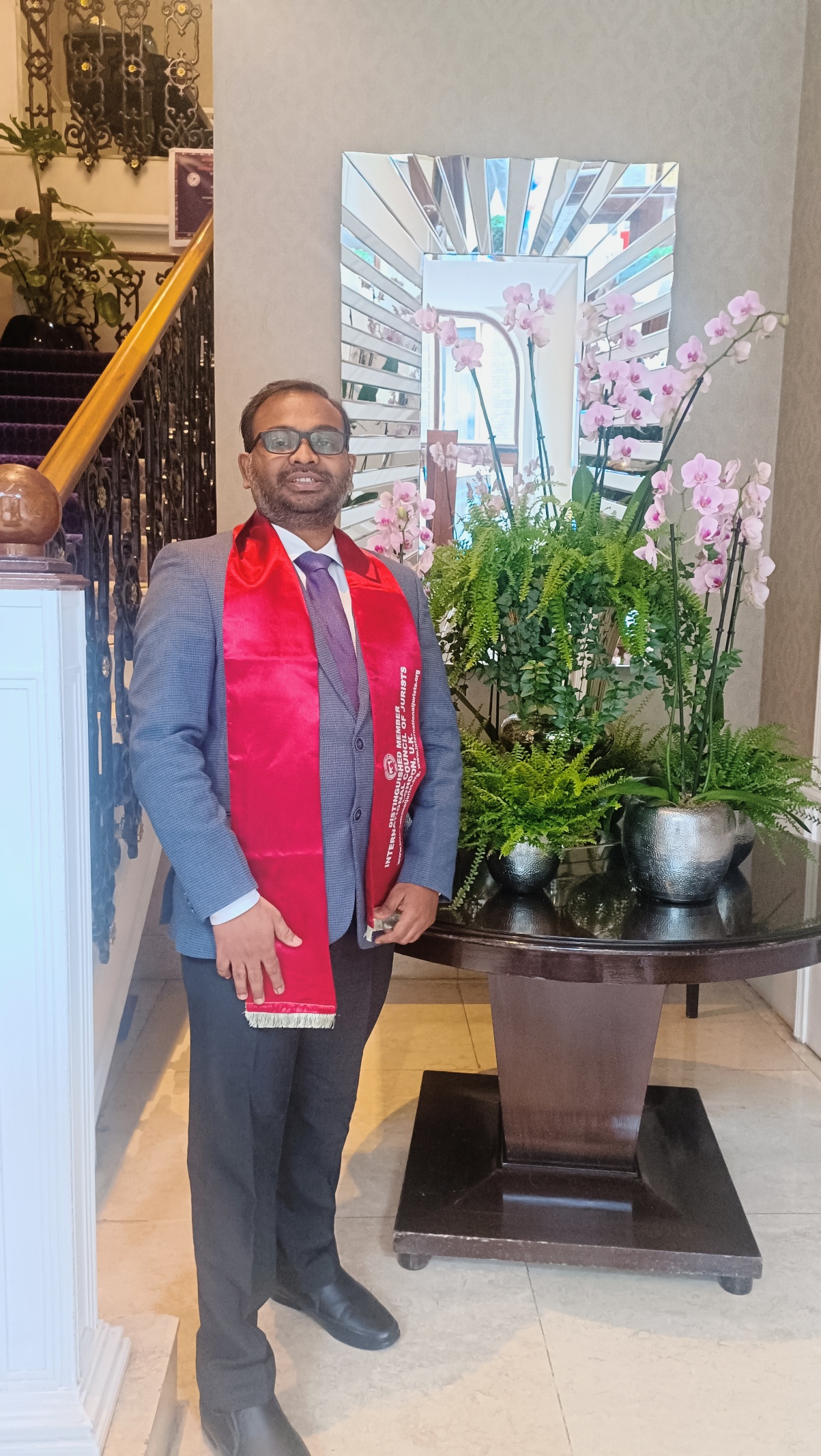 Dr. Swapnil Choudhary wearing Ceremonial Red Sash of ICJ London